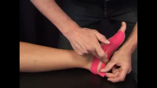 Foot with CureTape kinesiologie tape (Medical Taping Concept)