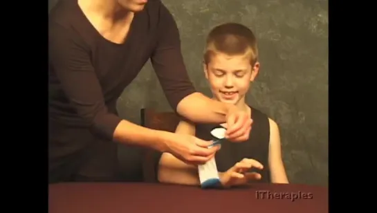 Pediatric Kinesio Taping.  Wrist Ext Assist  Buttonhole