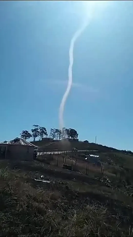 ?.))...dust devil abducting someone