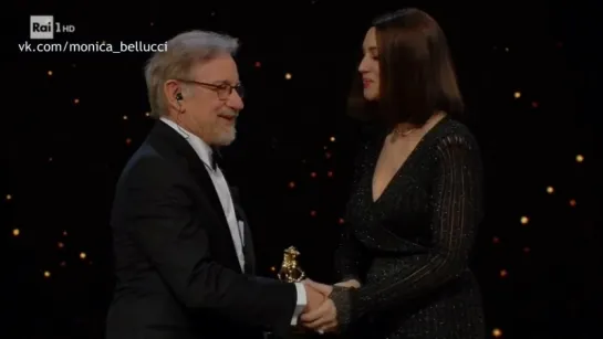 Steven Spielberg receives the Special Award from Monica Bellucci during the 62nd David Di Donatello awards ceremony on March 21,