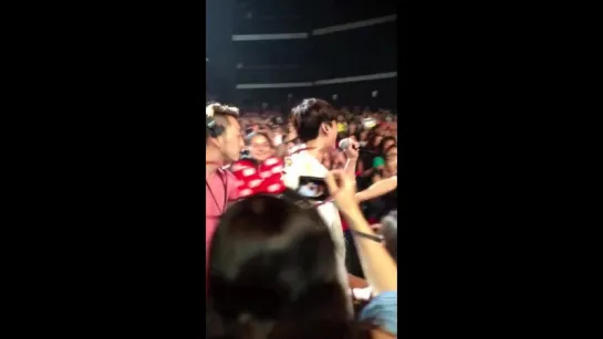 TVXQ IN L.A. 07052013 Changmin coming down the aisle. I think he got hit by some