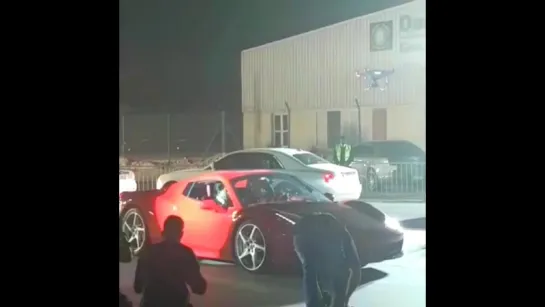 Shah Rukh Khаns Grаnd Entry in a Red Ferrari at an Event in Dubai