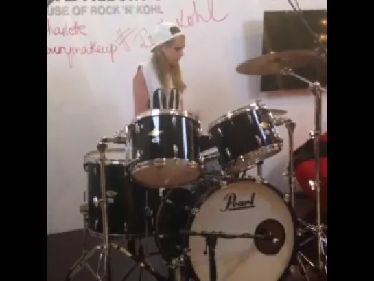 Cara Delevingne drumming