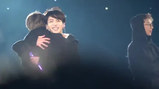 look at jungkooks smile when hugging seokjin