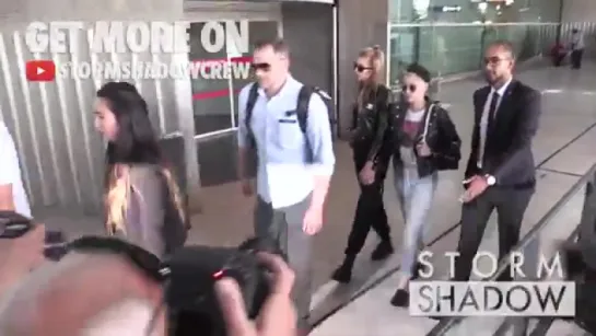 EXCLUSIVE - Kristen Stewart and girlfriend Stella Maxwell hold hands at Paris CDG airport (13/06)