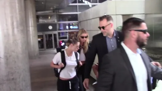 Kristen Stewart And Stella Maxwell arrived at LAX - May 20