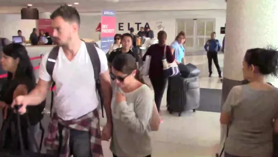 Lea Michele and her boyfiend Matthew Paetz departing at LAX Airport