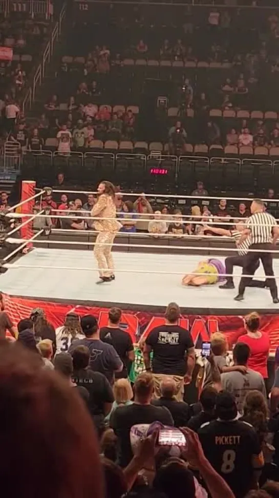 Rollins and Riddle beating each other up after the show went off the air WWERaw