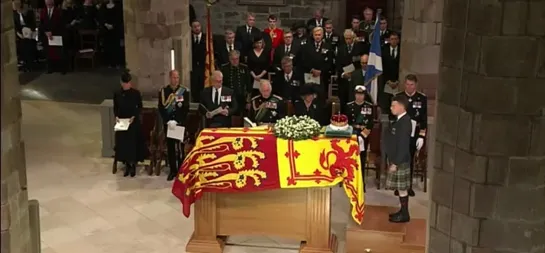 The Duke of Hamilton places the Crown of Scotland on the coffin of Queen Elizabeth II.