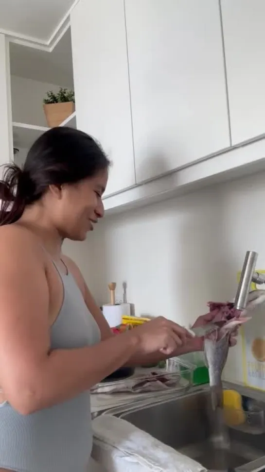 hellen escobar -cooking some fish