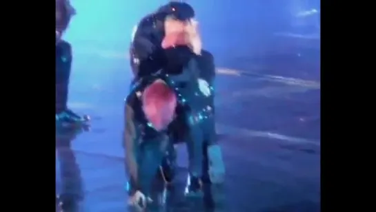 jungoo's sliding his hand on tae's back