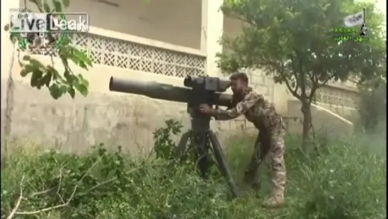 Сирия.Уничтожение пусковой установки САА "Слон" из ПТРК BGM-71TOW.Близ Джиср Аш-Шугур провинции Идлиб.09.05.2015.