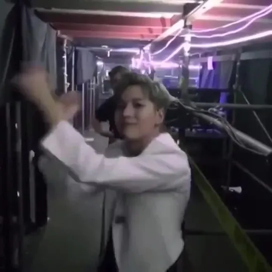 baby cheese backstage while he waits for his turn to come on stage - - look at all the cute things he does - SHINee TAEMIN