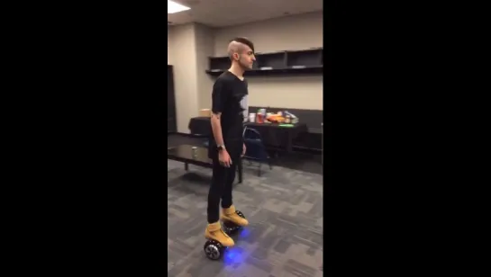 Snapchat Mitch on hoverboard