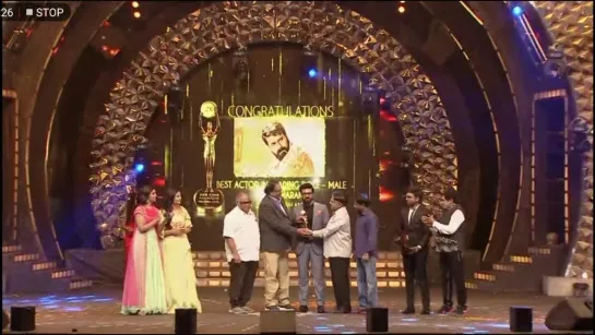 RamCharan receiving award for best actor male for Rangasthalam