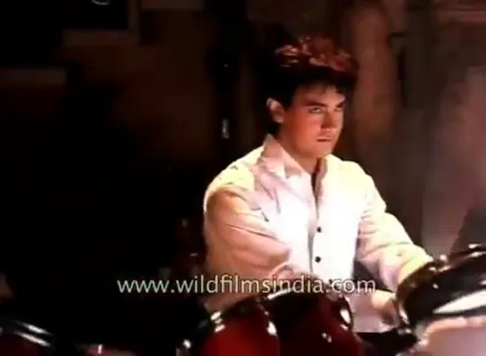 Throwback Aamir Khan playing drum in during Raja Hindustani filming 1996 - Throwback AamirKhan FridayFeeling