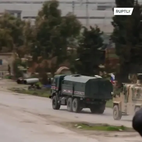 Russian and Turkish forces seen driving near Saraqib as ceasefire comes into force - Syria