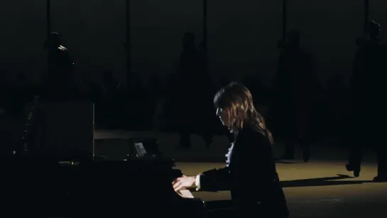 Charlotte Gainsbourg playing piano at SAINT LAURENT - MENS WINTER 23 SHOW