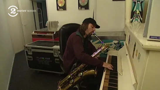 Dana Colley plays the piano and sax at the same time