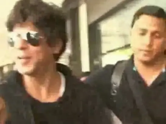 Shahrukh Khan returns from london seen at mumbai airport.