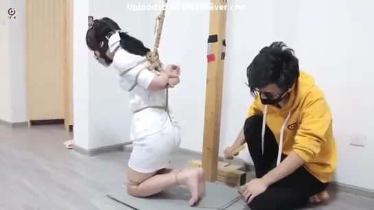 GirlHumiliatedInBondage