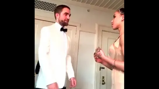 Robert Pattinson with FKA twigs while prepping for the MET Gala (02.05.2016)