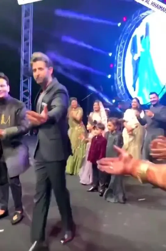 Forever obsessed with this video of hrithik dancing in black suit, unbuttoned shirt and messy hair. - -