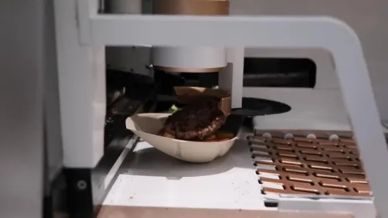 A robot cooks burgers at startup restaurant Creator