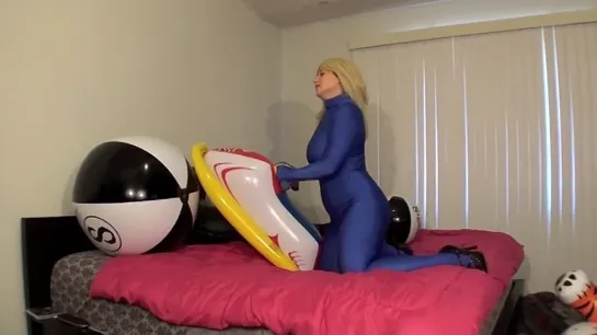 Blue girl popping pool toys