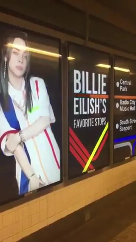 billie spotted on train station platform billboards