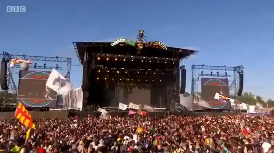 billie performing “bellyache” at glastonbury festival