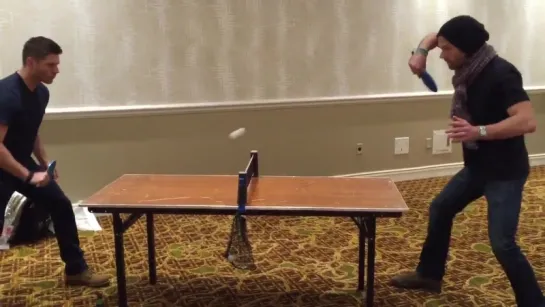 Jensen and Jared playing ping pong