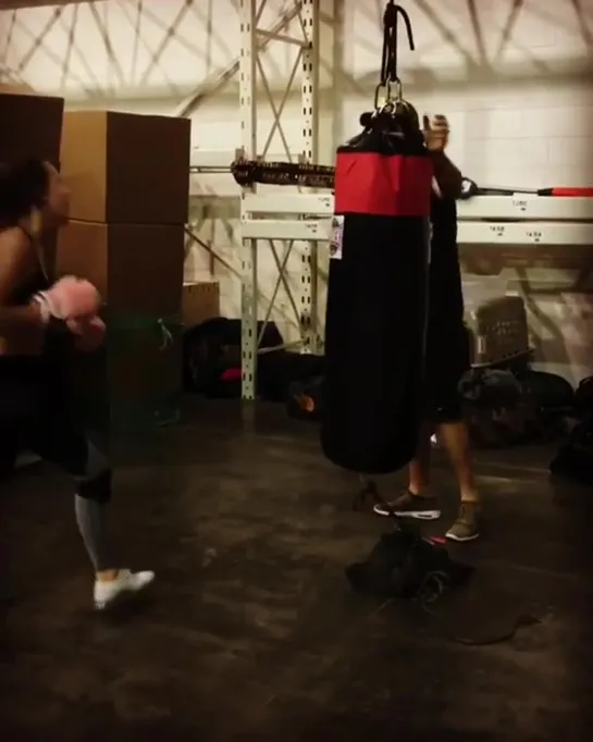 Millie Bobby Brown playing boxing