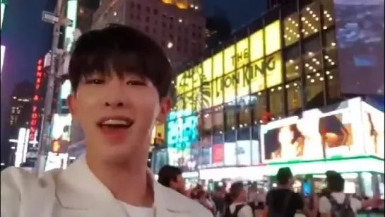 Wonho at Times Square in New York City with the Monsta X billboard behind him!!