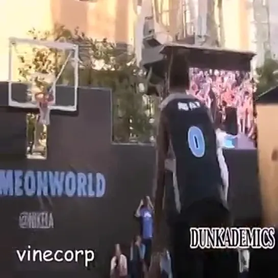 Amazing cartwheel through the legs dunk at a nike competition