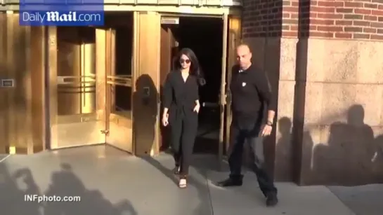 Selena swaps her two piece dress for a comfy black jumper