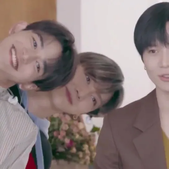 ten adorably peeking into the frame