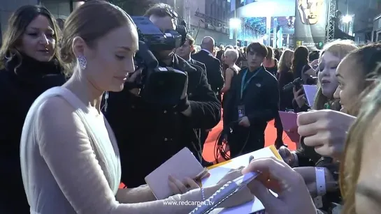 EE BAFTA 2015 - Sam Claflin - Laura Haddock - Red Carpet Arrival