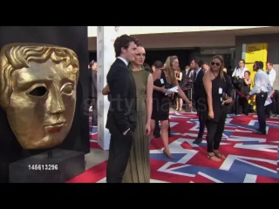 Actors Sam Claflin & Laura Haddock at TV BAFTAS CLEAN  on May 27, 2012 in London, England