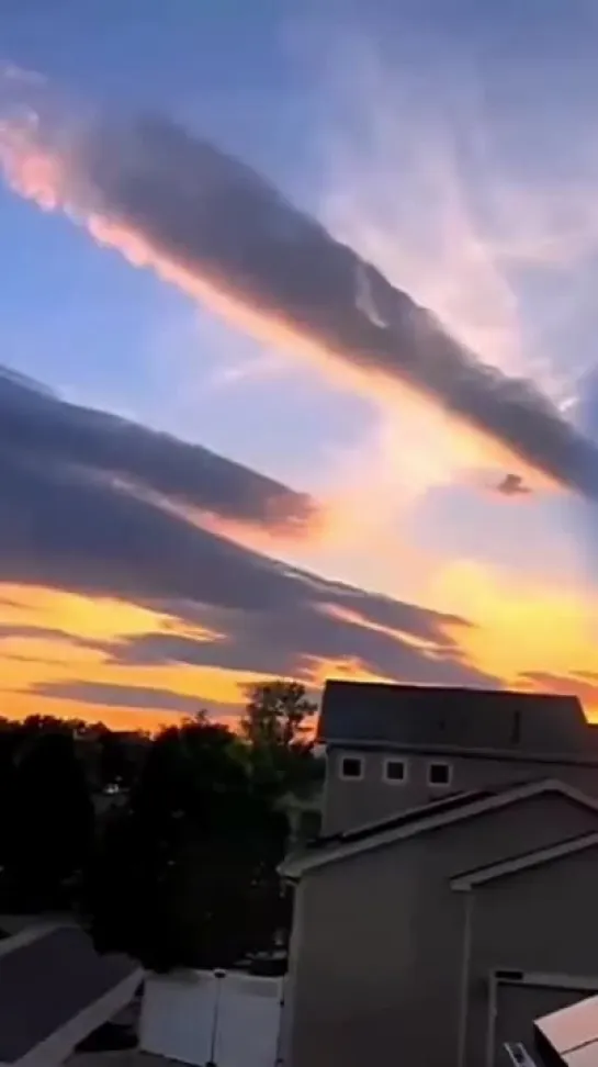 Rare rainbow colored scarf cloud over Haikou city in China