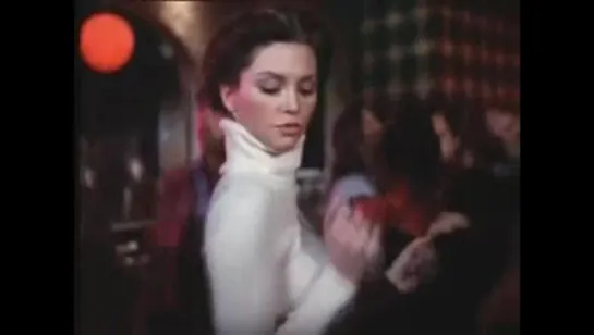 Pam (sweater girl) dancing for Bobby (Dallas)