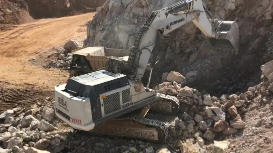 Liebherr 984 Excavator Loading Cat 773B Dumpers - Labrianidis SA