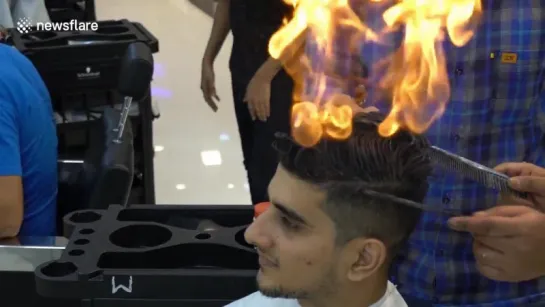 Indian barber cuts men’s hair by setting it on FIRE