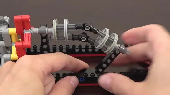 20 Mechanical Principles combined in a Useless Lego Machine