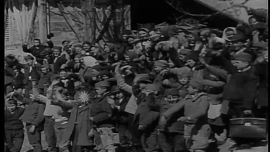 Yugoslav children wave at marching Yugoslav troops. HD Stock Footage