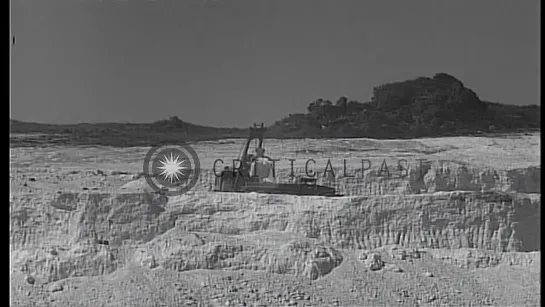 P-47 planes and Power Shovel at work in Isley Field base of US Military in Saipan...HD Stock Footage