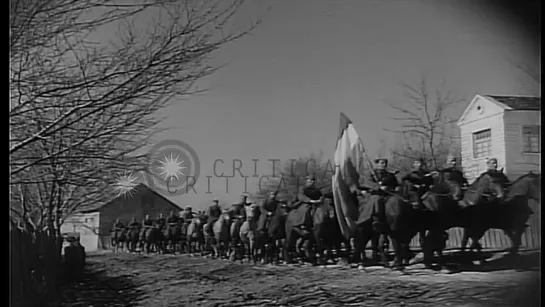 Civilians gather to see marching Yugoslav troops. HD Stock Footage