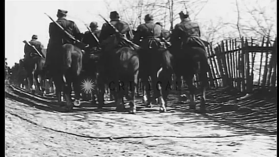 Civilians wave at the marching Soviet troops. HD Stock Footage