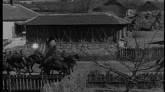 Marching troops follow the soldiers on the horseback. HD Stock Footage