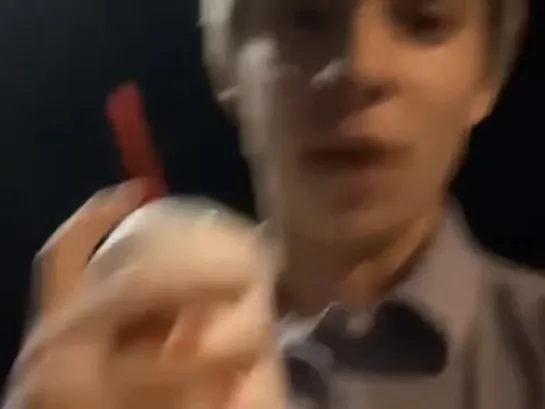 guy screaming for help while holding a chick fil a drink